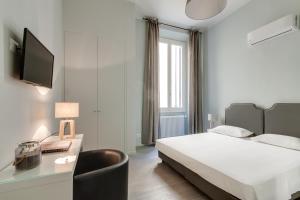 Posteľ alebo postele v izbe v ubytovaní Apartments Florence-Ginori Terrace