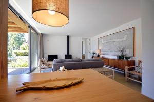 a living room with a couch and a table at Villa 292 in Caminha
