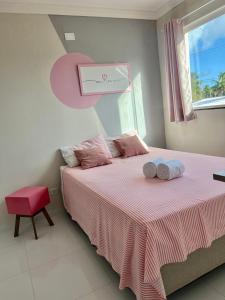Tempat tidur dalam kamar di Bella Peroba Flats #5 Rosé - Maragogi - AL