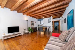 Et tv og/eller underholdning på Atelier San Giacomo - Central Apartment