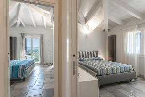 Ένα ή περισσότερα κρεβάτια σε δωμάτιο στο Villa the Queen +44 φωτογραφίες