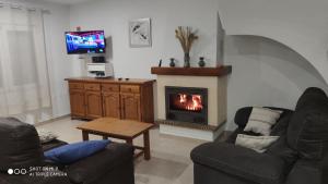 Ruang duduk di Residencial Olival-Acceso privado playa por jardín