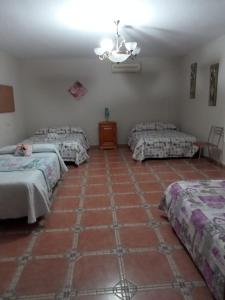 En eller flere senger på et rom på Casa en Pantano de la Breña