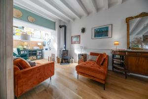 Coin salon dans l'établissement Grande Maison Cusset - Maison de ville et Studio