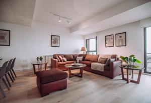 Istumisnurk majutusasutuses Gloom 3-BR Apt in Tilal Faqra