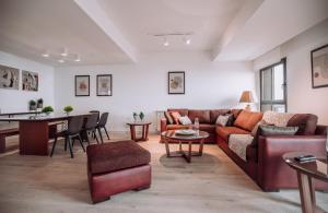 Istumisnurk majutusasutuses Gloom 3-BR Apt in Tilal Faqra
