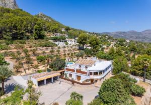 an aerial view of a house with a mountain at Villa Joan - PlusHolidays in Calpe