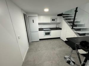 Kuchyň nebo kuchyňský kout v ubytování Apartamento tipo Dúplex - NO SE ADMITEN MASCOTAS, NO PETS