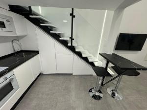 Kuchyň nebo kuchyňský kout v ubytování Apartamento tipo Dúplex - NO SE ADMITEN MASCOTAS, NO PETS