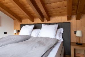 Postel nebo postele na pokoji v ubytování Chalet Vedig