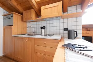 Kuchyň nebo kuchyňský kout v ubytování Chalet Vedig