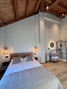 Cama o camas de una habitación en Aldea Rural y Gastro Restaurante Casona de Labrada