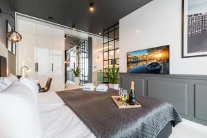 Posteľ alebo postele v izbe v ubytovaní Q18 ApartHotel