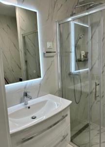 Koupelna v ubytování Palm Beach Apartment, Povljana