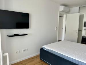 Postel nebo postele na pokoji v ubytování Palm Beach Apartment, Povljana