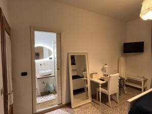 TV a/nebo společenská místnost v ubytování B&B Casa TORET