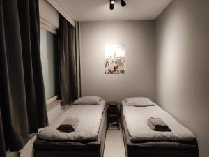 Кровать или кровати в номере Main Street magic apartment