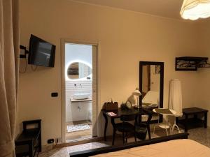 TV a/nebo společenská místnost v ubytování B&B Casa TORET