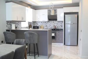 Kuchyň nebo kuchyňský kout v ubytování Bliss Villa