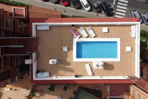 an overhead view of a computer on top of a building at A piece of paradise in Puerto de la Cruz in Puerto de la Cruz +5 photos