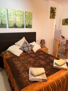Postel nebo postele na pokoji v ubytování 2 Bedroom Apartment Jardines Canarios Los Cristianos Tenerife