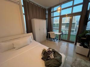 ThePenthouse Coliving II客房内的一张或多张床位