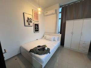 ThePenthouse Coliving II客房内的一张或多张床位