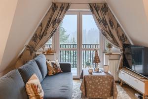 Posedenie v ubytovaní Apartament Chateau Karpielówka Kościelisko