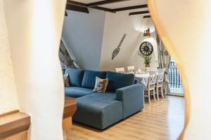 Posezení v ubytování Apartament Chateau Karpielówka Kościelisko