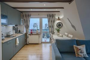 Kuchyň nebo kuchyňský kout v ubytování Apartament Chateau Karpielówka Kościelisko