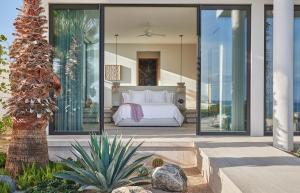 Postel nebo postele na pokoji v ubytování Four Seasons Resort Los Cabos