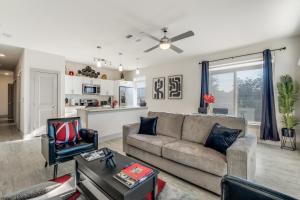 a living room with a couch and a table at Radiant condo on the Riverwalk 1325 in San Antonio