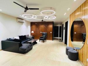 Zona de estar de Room in Airb&b New Delhi - Divine Inn Service Apartments