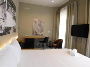 TV a/nebo společenská místnost v ubytování MIK Hotel Korce