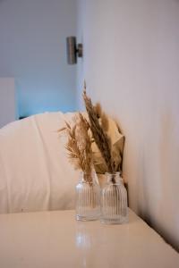 Postel nebo postele na pokoji v ubytování B&B La Ferme de l'Hosté