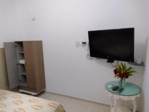 Televiisor ja/või meelelahutuskeskus majutusasutuses Casa mobiliada de 1 quarto na R Oliveira Alves Fontes, 597 - 597 A - Jardim Gonzaga
