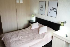Posteľ alebo postele v izbe v ubytovaní Gdańsk Szafarnia Waterlane SPA by Jacek Budek + 37 fotografií