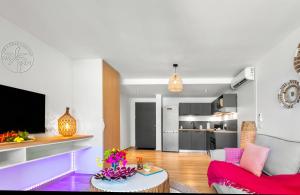 Dapur atau dapur kecil di Face à la plage de la Baie Orientale - Appartement 4p VUE MER