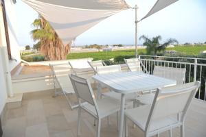 A balcony or terrace at Birgi holiday home