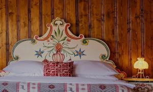 Postel nebo postele na pokoji v ubytování Hotel Křížový vrch