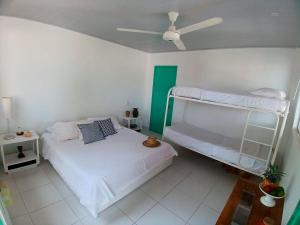 Postel nebo postele na pokoji v ubytování Isla Tortuga - Prado - Deportes Náuticos - Cerca a Bogotá - Cerca a Ibagué + 22 fotografií