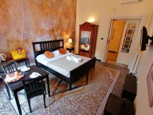 Postel nebo postele na pokoji v ubytování B&B Genova Centro