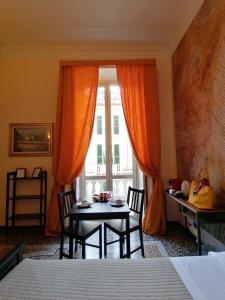 Postel nebo postele na pokoji v ubytování B&B Genova Centro