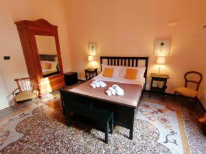Postel nebo postele na pokoji v ubytování B&B Genova Centro