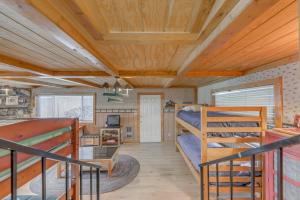a room with two bunk beds and a desk at Home Near Lincoln National Forest with Private Sauna in Cloudcroft