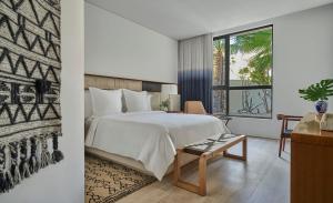 Postel nebo postele na pokoji v ubytování Four Seasons Resort Los Cabos