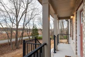 - une terrasse couverte avec vue dans l'établissement Brand New in Goodlettsville, à Goodlettsville