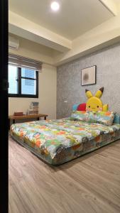 Voodi või voodid majutusasutuse Panda Homestay toas