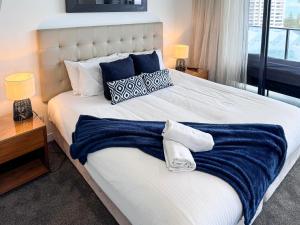 Letto o letti in una camera di Oracle 11th floor Tower 1 - GC Getaways