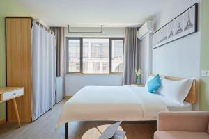 Fotografie z fotogalerie ubytování DuoDuo Hotel Apartment - Yiwu International Trade City v destinaci I-wu